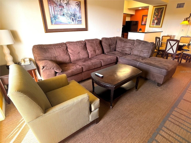 8100 Poinciana Blvd Unit 2703, Orlando, FL 32821 - living room featuring carpet flooring