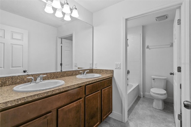 full bathroom featuring tub / shower combination, vanity, a notable chandelier, tile patterned floors, and toilet