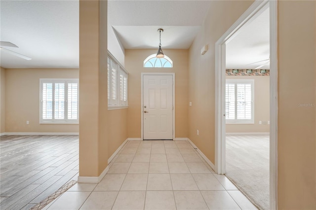 entryway featuring light tile patterned flooring