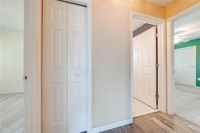 hallway featuring light hardwood / wood-style flooring