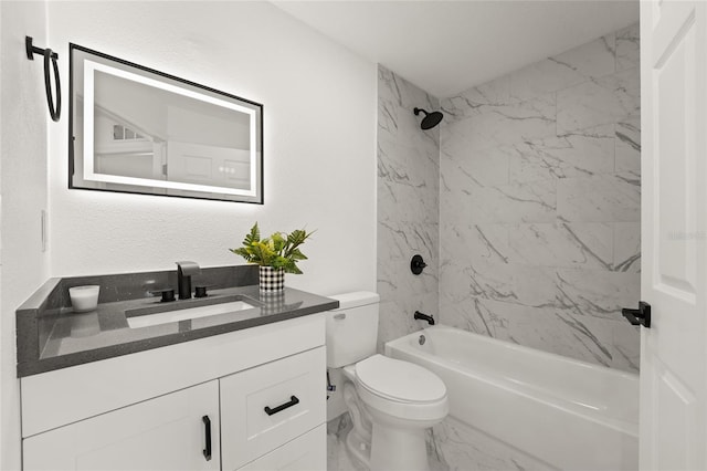 full bathroom featuring vanity, toilet, and tiled shower / bath