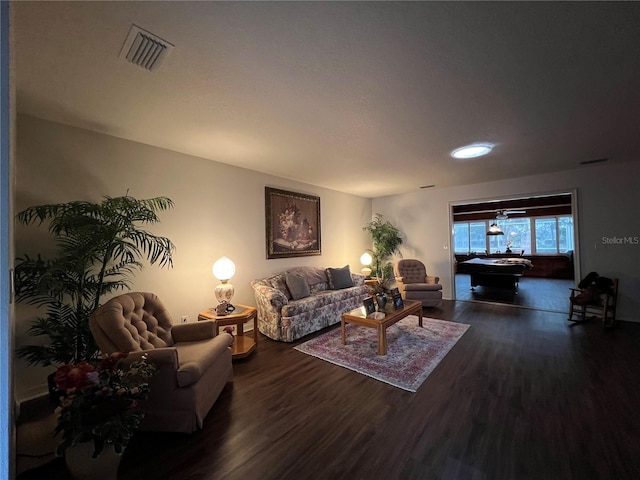 living room featuring dark hardwood / wood-style floors