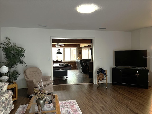 living room featuring dark hardwood / wood-style floors