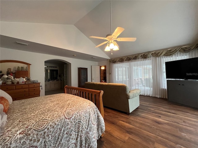 bedroom with vaulted ceiling, dark wood-type flooring, and ceiling fan