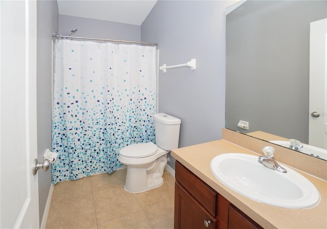 bathroom with vanity, toilet, tile patterned floors, and a shower with curtain