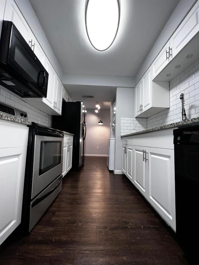 kitchen featuring white cabinetry, dark hardwood / wood-style flooring, black appliances, and tasteful backsplash