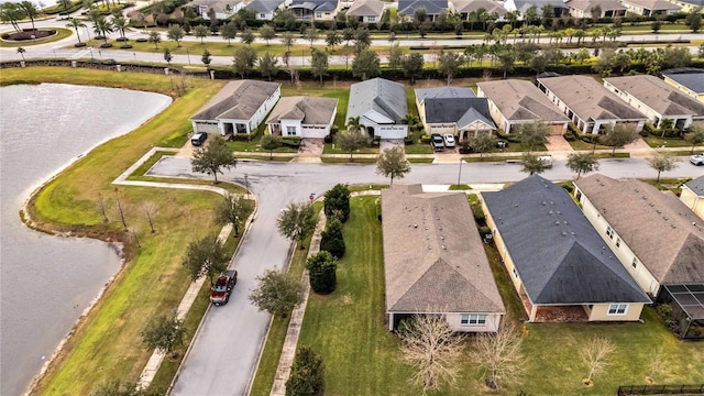 drone / aerial view featuring a water view