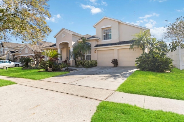 view of front of house with a garage and a front lawn