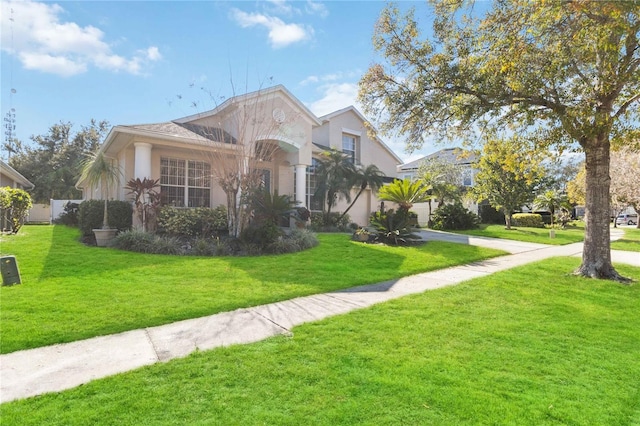 view of front of home featuring a front yard