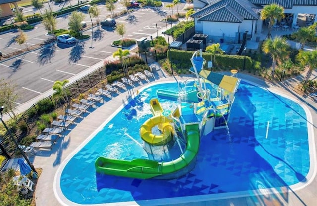 view of swimming pool featuring a water slide