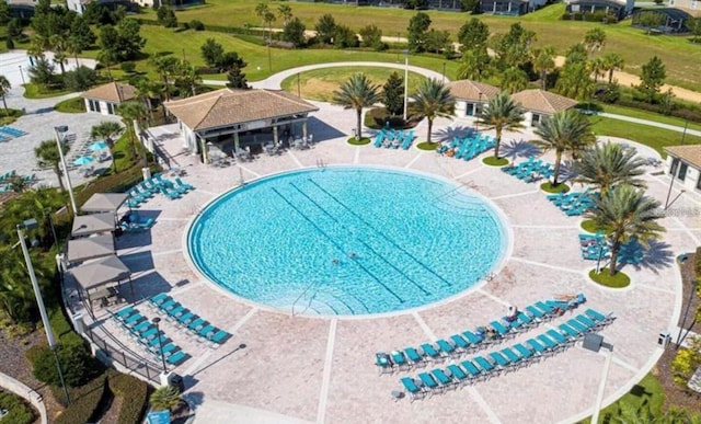 view of swimming pool featuring a patio area