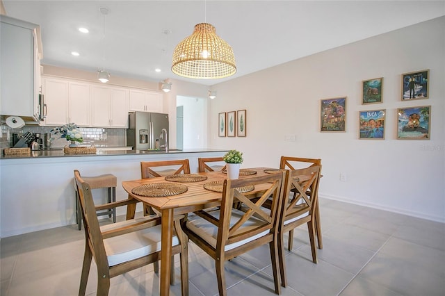 dining space with light tile patterned flooring