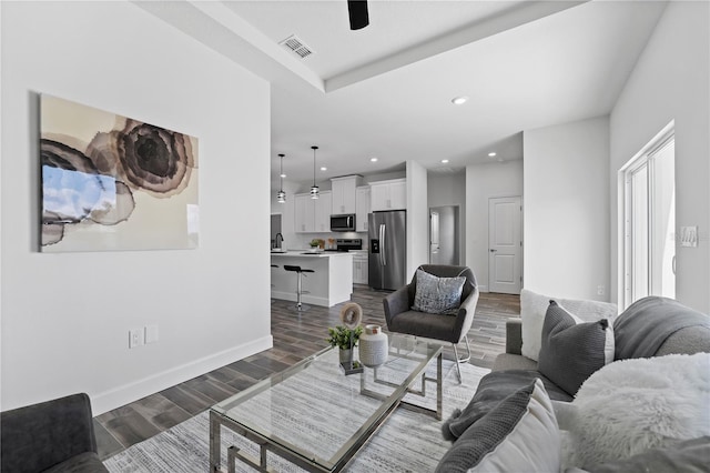 living room featuring ceiling fan