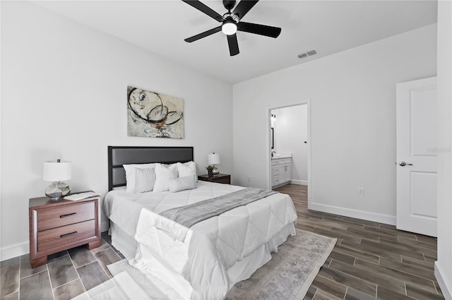 bedroom with ceiling fan and connected bathroom