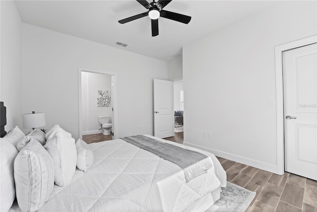 bedroom featuring ensuite bathroom and ceiling fan