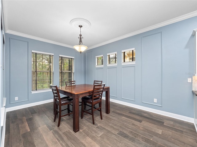 dining area featuring crown molding and dark wood-type flooring