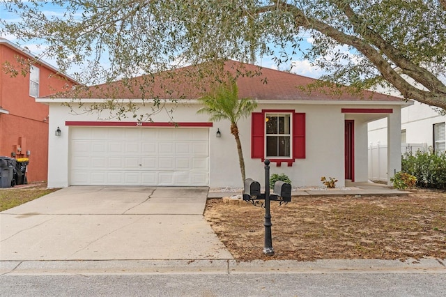 single story home with a garage