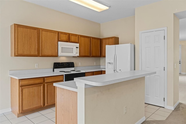 kitchen with white appliances, light tile patterned flooring, and a kitchen island