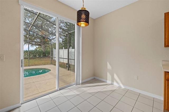 entryway with light tile patterned flooring