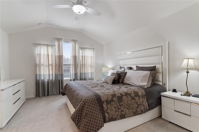 carpeted bedroom with lofted ceiling and ceiling fan