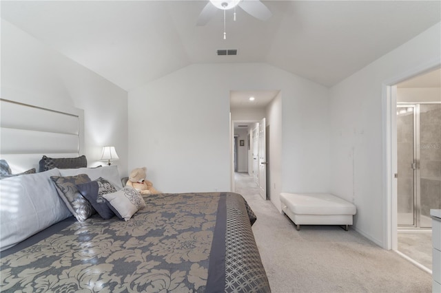 carpeted bedroom with lofted ceiling, ceiling fan, and ensuite bathroom