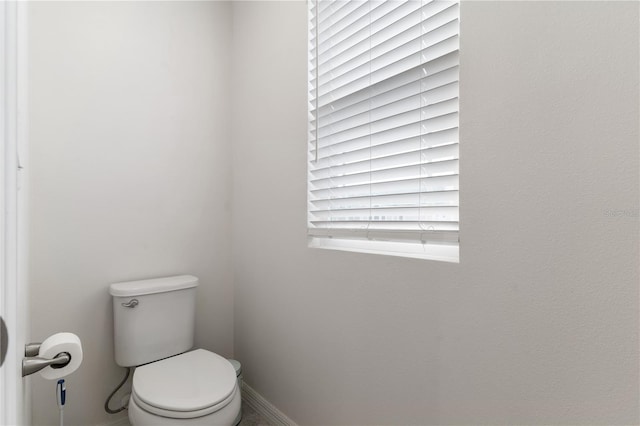 bathroom featuring toilet