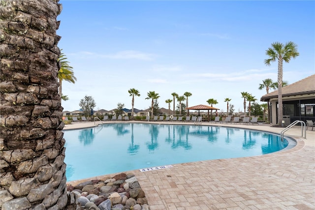 view of pool with a gazebo and a patio