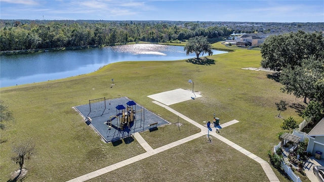 drone / aerial view with a water view