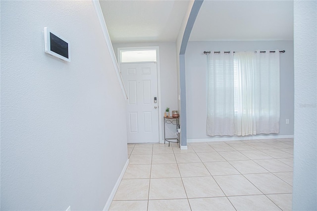 view of tiled foyer entrance