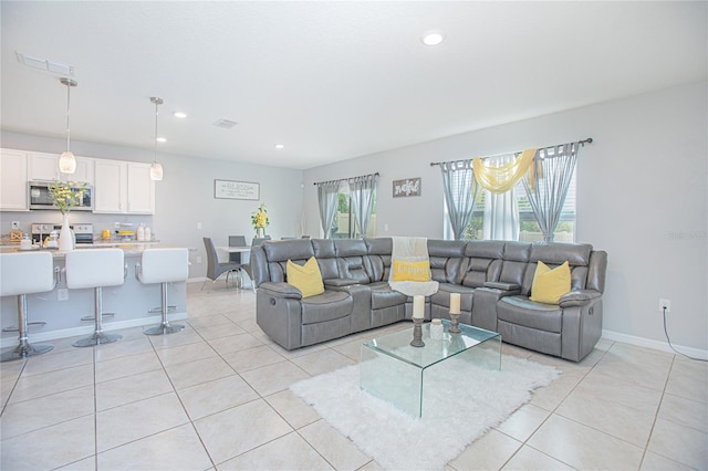 living room with light tile patterned floors