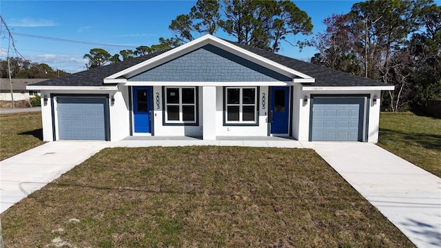 ranch-style house featuring a garage, a front lawn, and covered porch