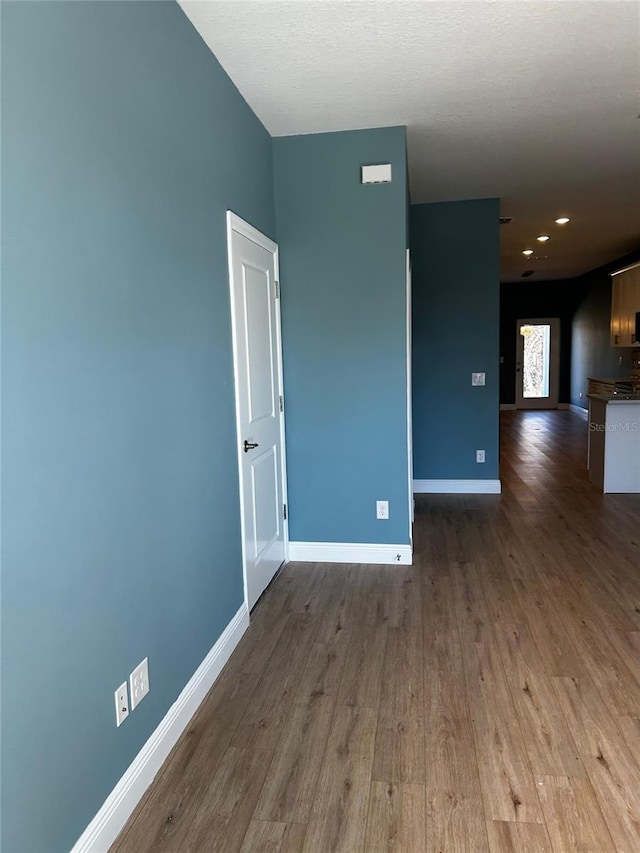 unfurnished room featuring hardwood / wood-style floors