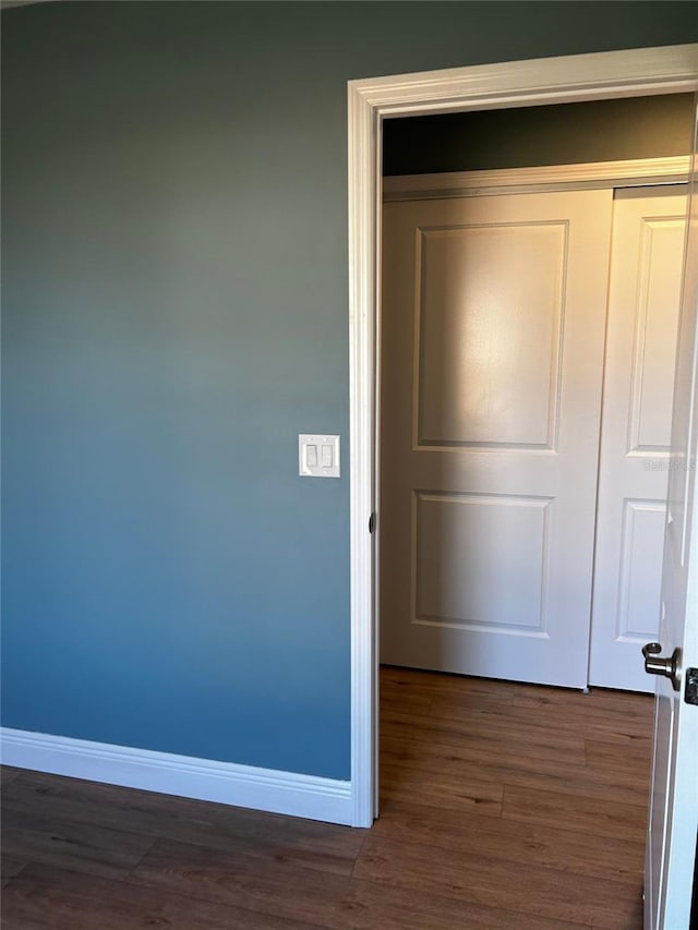 interior space featuring dark wood-type flooring