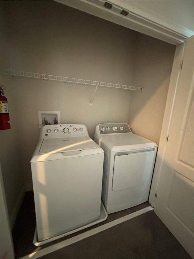 laundry room featuring independent washer and dryer