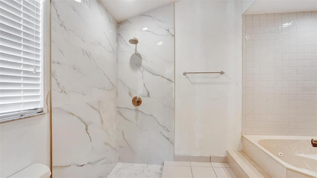 bathroom featuring plus walk in shower and tile patterned flooring