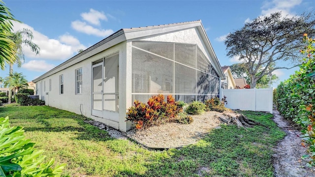 view of property exterior featuring a yard