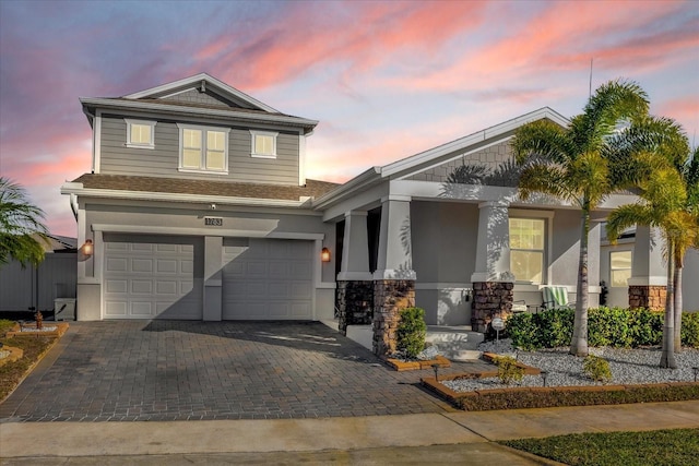 view of front of property featuring a garage