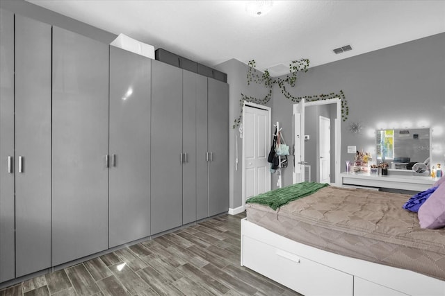 unfurnished bedroom featuring wood-type flooring