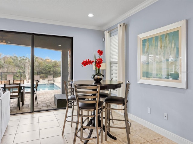 tiled dining space with crown molding