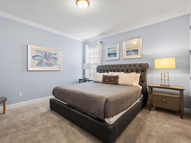 bedroom featuring crown molding, carpet, and a textured ceiling