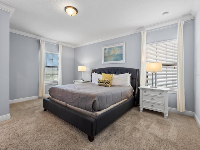 bedroom with light colored carpet, ornamental molding, and multiple windows