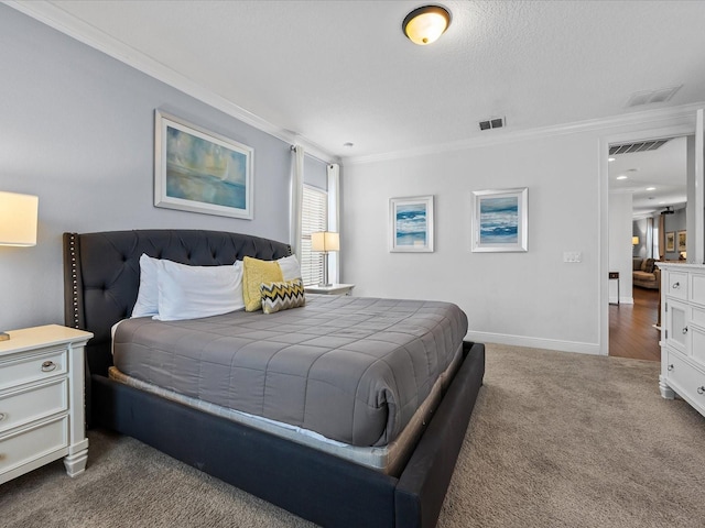 bedroom featuring crown molding, a textured ceiling, and dark colored carpet