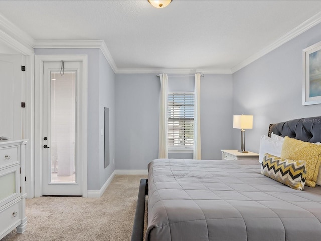 bedroom with crown molding and light colored carpet