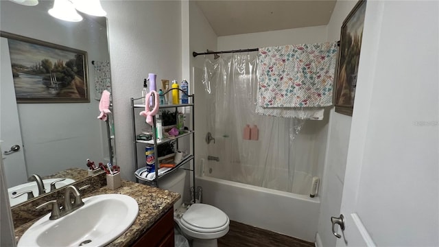 full bathroom with vanity, shower / bath combination with curtain, and toilet