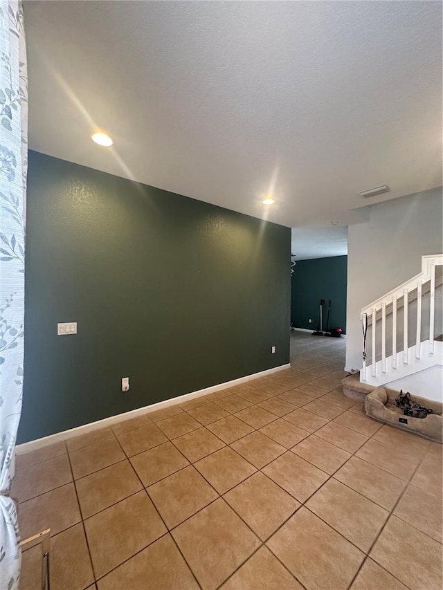 view of tiled spare room