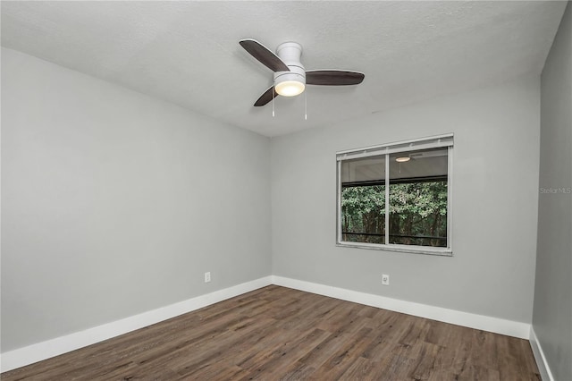 unfurnished room featuring wood-type flooring, a textured ceiling, and ceiling fan