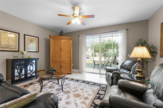 living room with light tile patterned floors and ceiling fan