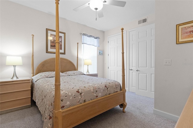 bedroom with light colored carpet and ceiling fan