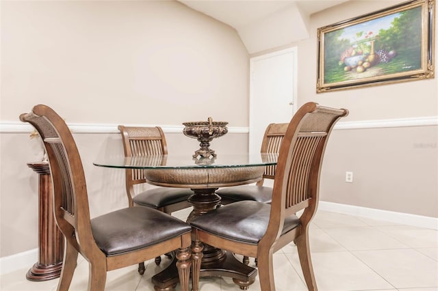 dining area with light tile patterned floors