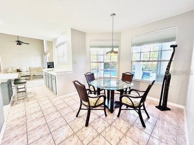 dining area featuring ceiling fan